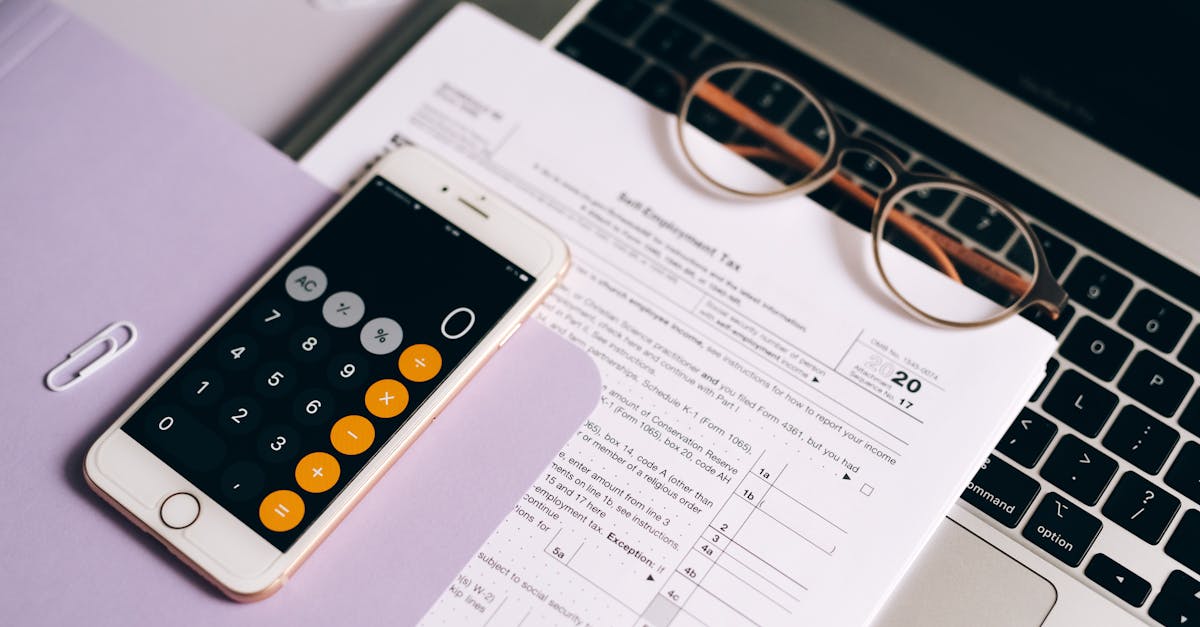 A small business contact page audit with phone, laptop, and redesign notes.